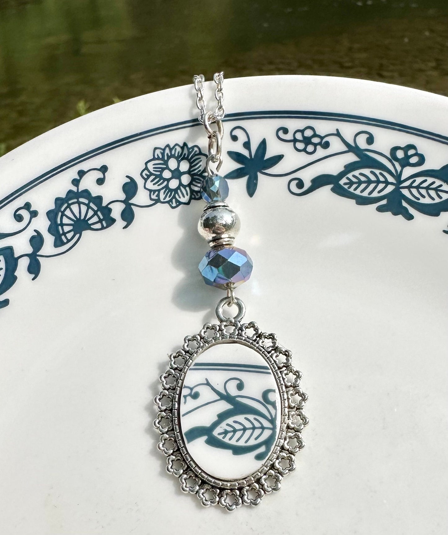 Beautiful one of a kind 1970s Correlle Old Town Blue, Onion Pattern Pendant necklace with silver findings and blue iridescent beads
