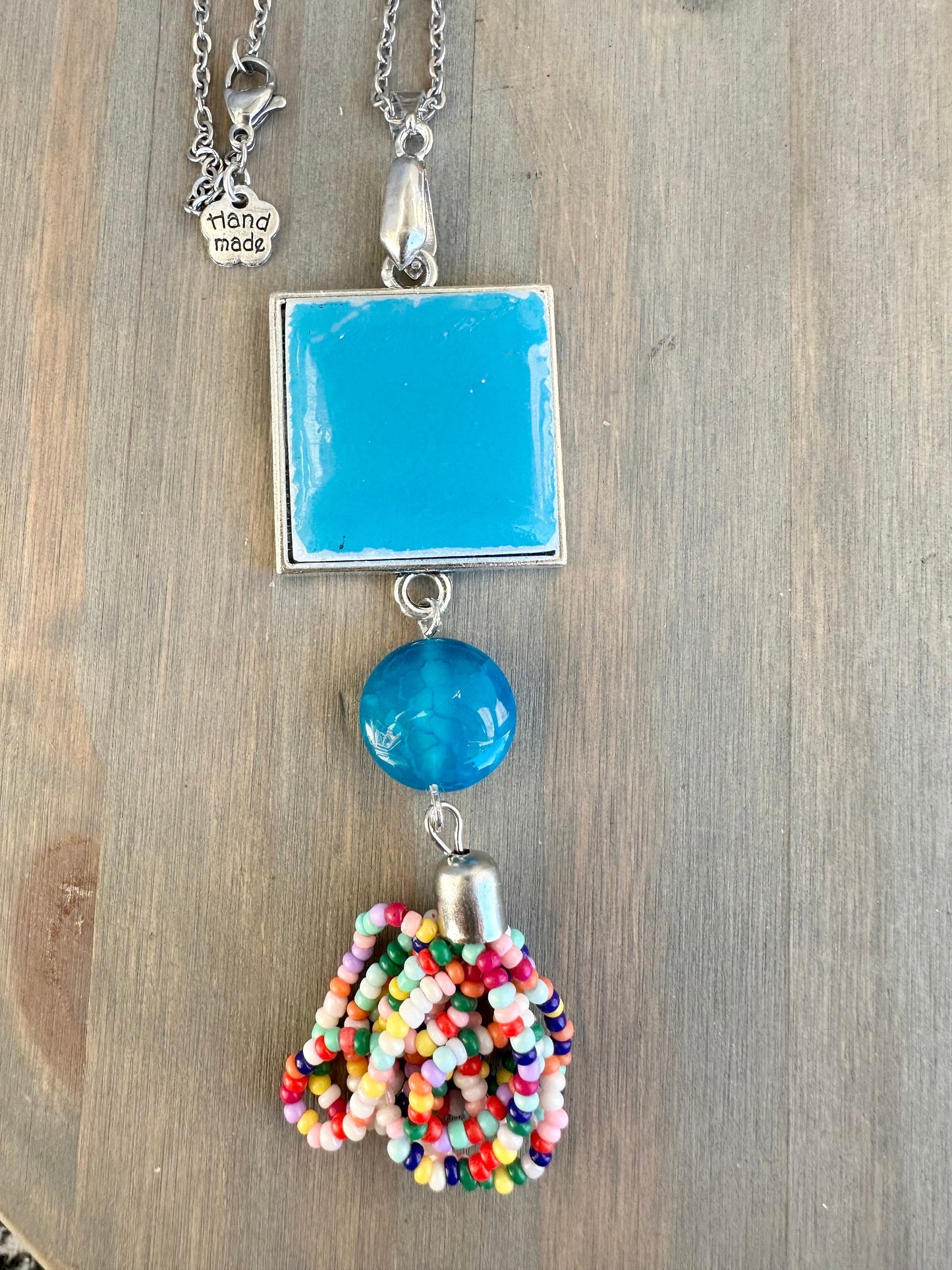 Beautiful broken china pendant necklace using a vintage 1970s Pyrex square pendant with tassel silver pendant necklace