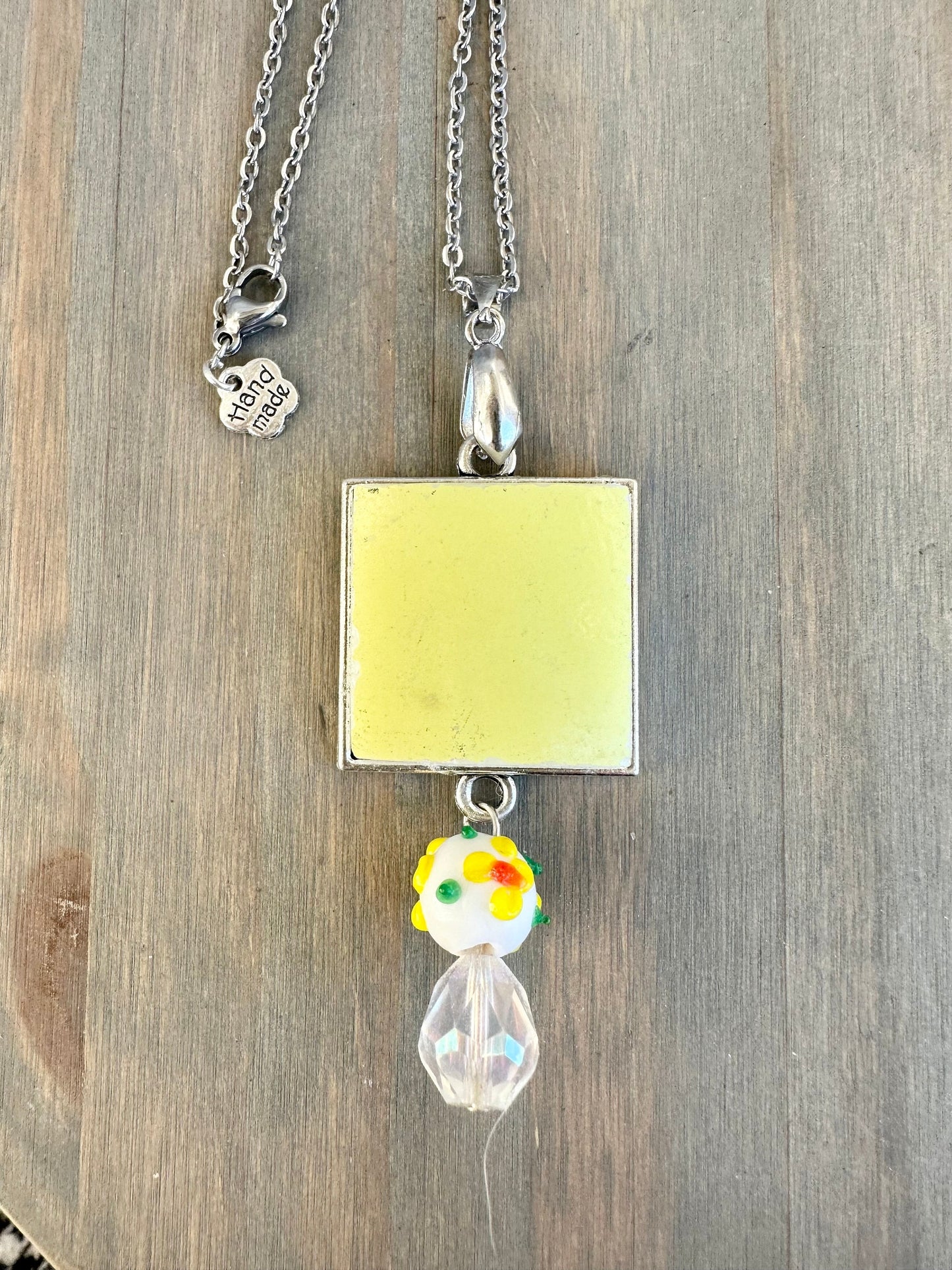 Beautiful broken china pendant necklace using a vintage 1970s Pyrex square pendant with tassel silver pendant necklace