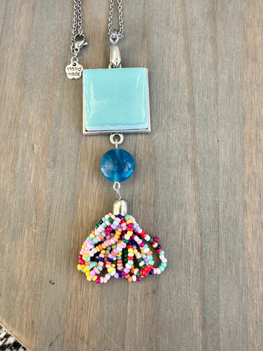 Beautiful broken china pendant necklace using a vintage 1970s Pyrex square pendant with tassel silver pendant necklace